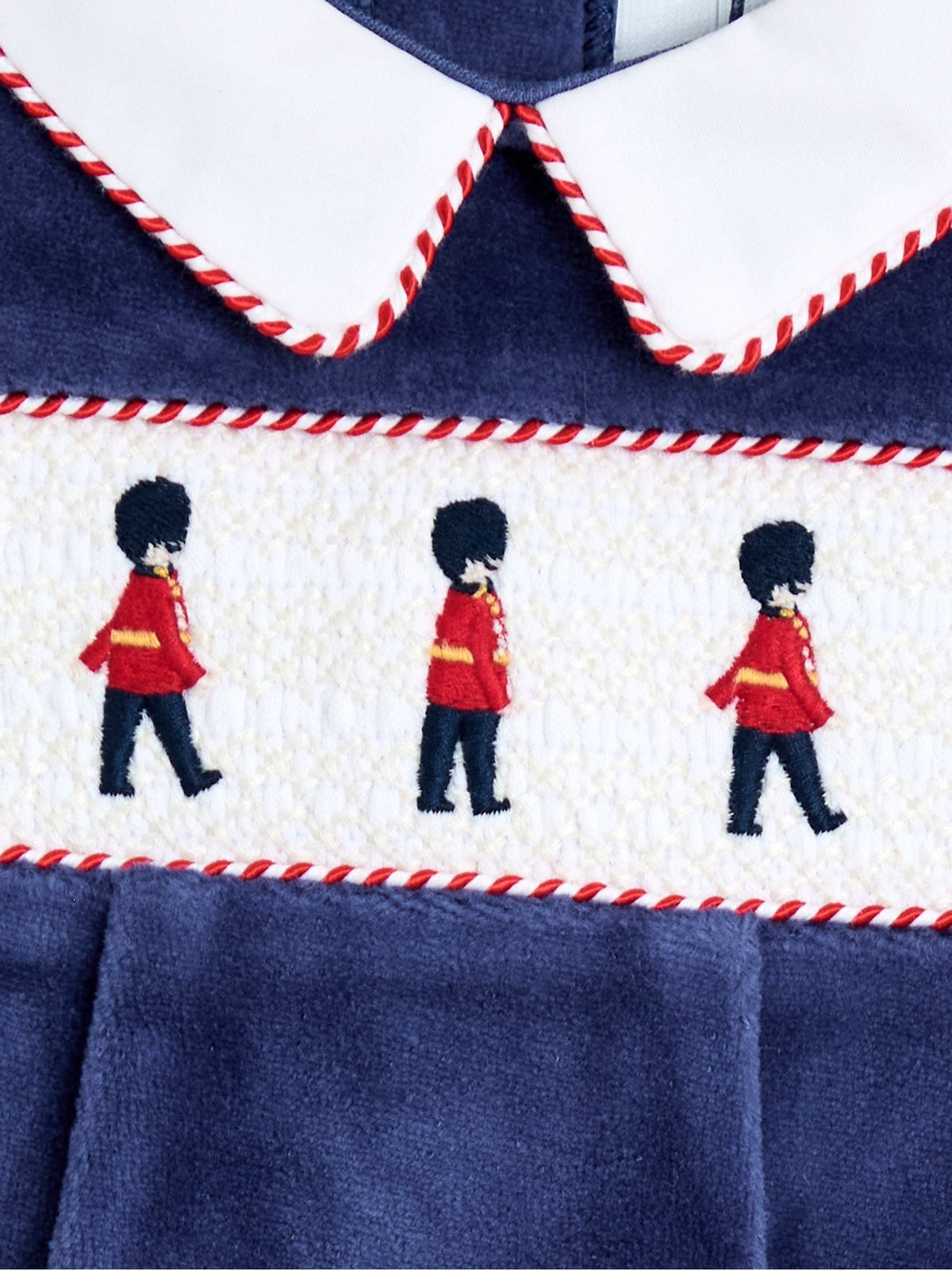 JoJo Maman Bébé Navy Soldier Smocked Velour Footed All-In-One
