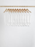 White 10 Pack Baby Strappy Bodysuits