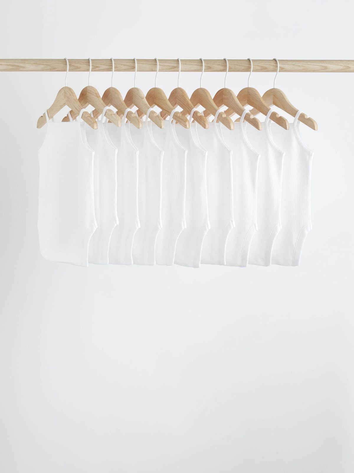 White 10 Pack Baby Strappy Bodysuits