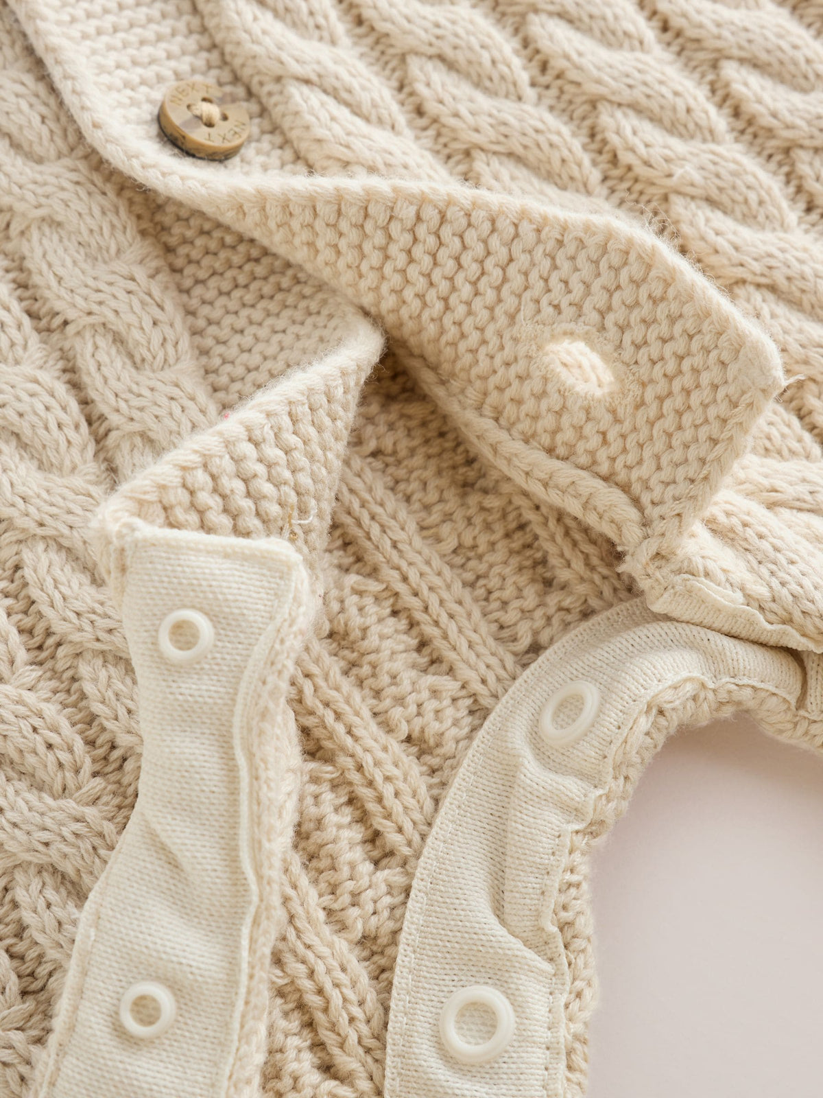 Neutral Knitted Cable Baby Romper (0mths-3yrs)